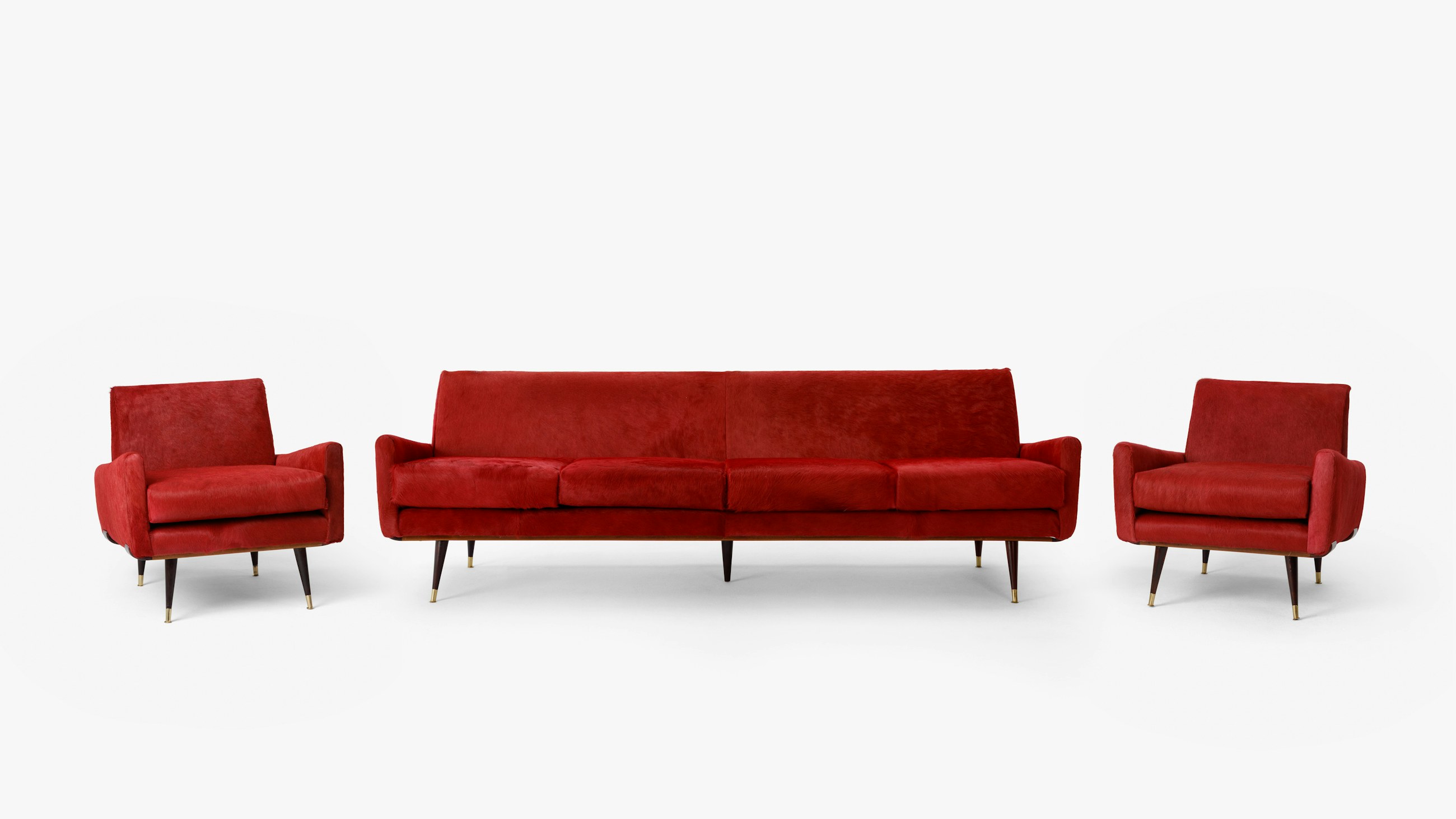 Jorge Zalszupin 801 series lounge chair beside a sculptural side table
